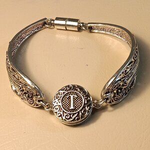 Snap button 'T' initial charm silver-tone spoon bracelet w/ magnetic closure